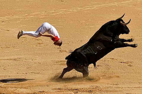 A Recortador jumps over a bull